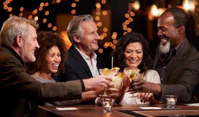 a group of people sitting at a table